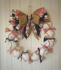 a wreath made out of baseballs and burlocks