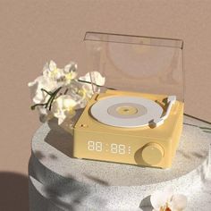 a record player sitting on top of a cake