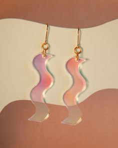 The squiggles continue to be such a popular fun shape! These earrings are on the smaller side but they are perfect for every day wear if you need a unique accessory. They are available in a variety of unique textures and colors. Made with acrylic and plated gold steel findings. Earrings measure 0.125" by 2" by .5." Unique Earrings Surgical Steel, Abstract Squiggle Earrings, Squiggly Jewelry, Unique Textures, Colorful Jewelry, Accessories Unique, Kansas City, Kansas, Plating