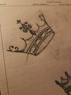 a drawing of a crown on top of a piece of paper