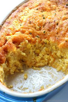 a casserole dish filled with corn and cheese