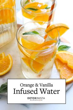 an orange and vanilla infused water is garnished with mint