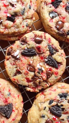 cookies with oreos and chocolate chips on a cooling rack