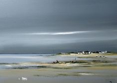 the sky is very dark and cloudy over the water at low tide beach on an overcast day