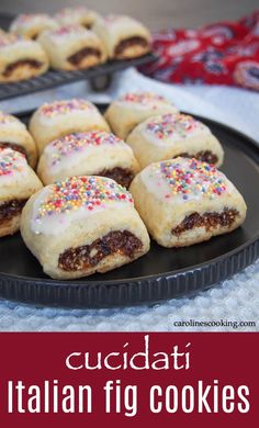 some cookies are on a black plate with sprinkles and red text that says cuccitati italian fig cookies