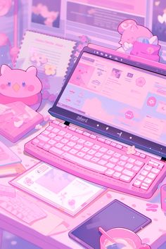 a pink laptop computer sitting on top of a desk