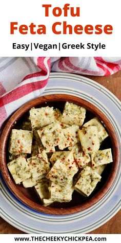 tofu cheese in a bowl with text overlay that reads, how to make tofu feta cheese easy vegan greek style