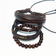 Elevate your wrist game with our 4pc braided leather brown bracelet set. Crafted from high-quality leather, these bracelets offer a stylish and versatile accessory option for any occasion. Whether you're dressing up for a night out or keeping it casual during the day, these trendy bracelets will add a touch of sophistication to your look. The set includes four different designs, allowing you to mix and match or wear them separately for a variety of looks. With their comfortable fit and durable construction, these bracelets are sure to become a staple in your accessory collection. Key Features; 👑 Stylish Designs: Each bracelet features a unique braided leather design, adding texture and visual interest to your wristwear. 💼 Versatile Accessory: Perfect for both casual and formal occasions, Casual Brown Leather Beaded Bracelets, Masculine Brown Braided Bracelet For Gift, Masculine Brown Braided Bracelet As Gift, Leather Bracelet For Men, Couples Accessories, Men's Bracelets, Brown Bracelet, Wrist Game, Luxury Wear