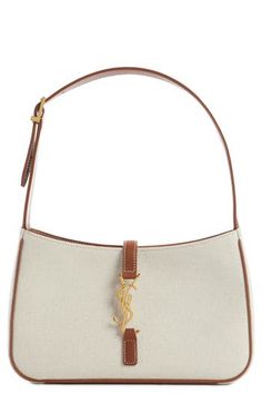 A slim, structured silhouette ensures this canvas bag fits perfectly under the arm. Hook tab closure Adjustable shoulder strap Structured silhouette with flat base for stability Textile with leather trim Made in Italy Designer Handbags Canvas Hobo Bag, Linen Canvas, Woman Bags Handbags, Mode Inspo, Chloe Drew, Sophisticated Style, Leather Trim, Hobo Bag