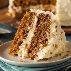 a slice of carrot cake on a white plate