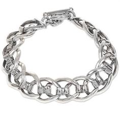 Bold and handsome, this sterling silver link bracelet is sure to impress. Wayan Asmana presents the work of Balinese artisans who meticulously craft this unique piece from interlocking sterling silver links featuring a high polish finish.