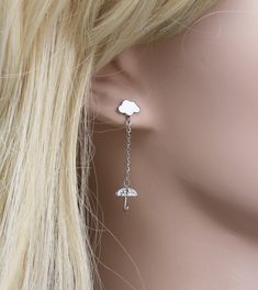 "☞ These earrings are a pair. ♥Cloud Earrings with raindrop umbrella♥ Cloud earrings with raindrops umbrella | Rain Cloud earrings | Raindrop earrings | earring/rain and cloud Simple daily earrings You good choice! ∙ ∙ ∙ ∙ ∙ ∙ ∙ ∙ ∙ D E T A I L S ∙ ∙ ∙ ∙ ∙ ∙ ∙ ∙ ∙ ∙ - MATERIAL: High-Quality Surgical steel. -Color : Silver, Clear -Dimension : Cloud - W:8mm X L:5mm, Rain : 24mm ,umbrella - W: 7 .5mm X L : 9mm - Bar thickness :1.2mm 16G ∙ ∙ ∙ ∙ ∙ ∙ ∙ ∙ ∙ ∙ P R E P A R A T I O N ∙ A N D ∙ P R O C E Raindrop Stud Earrings, Outer Conch, Umbrella Earrings, Back Piercing, Raindrop Earrings, Daily Earrings, Rain Earrings, Back Piercings, Cloud Earrings