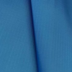 a close up view of a blue fabric