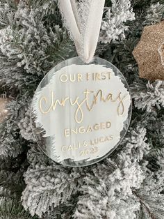 a christmas ornament hanging from the top of a tree