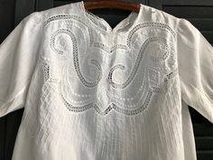 "French Edwardian Lace & Embroidery Blouse ja 3052105 Beautiful French white embroidery lace blouse from the early 1900s, Edwardian period. Delicate and airy cotton batiste has delicate lace accent at the front and around the collar (hand done). Amazing white on white embroidery design with tiny tuck seams...very well done. Tiny mother of pearl button closure at the back. Short sleeves with cuff end. The fabric is light, delicate and sheer, best worn with a camisole. Measuring; 34\" bust (fr White On White Embroidery, Lace Blouses, Frilly Blouse, Period Clothing, White Lace Blouse, Period Outfit, Girls Blouse, Embroidery Lace, Embroidery Blouse