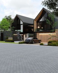 a car is parked in front of a house with large windows and wooden sidings