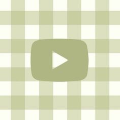 a green and white checkered background with a video player in the center that is playing