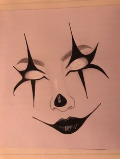 a drawing of a woman's face with black and white makeup