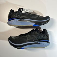 Nike Air Zoom Gt Cut 2 “Black Racer Blue” Style Code: Dj6015-002 Men’s Size 5.5 Women’s Size 7.5 Condition: Brand New No Box Introducing The Nike Air Zoom Gt Cut 2 In The Colorway "Black Racer Blue." This Sneaker Boasts A Uk Shoe Size Of 5, A Low Top Shoe Shaft Style, And A Style Code Of Dj6015-002. The Shoe Features A Blue Character And Comes In A Us Shoe Size Of 5.5 And An Eu Shoe Size Of 38. This Nike Air Zoom Gt Cut 2 Is Perfect For Athletic Use And Was Released In 2022. The Shoe Is Not Cust Black Low-top Dynamic Basketball Shoes, Dynamic Black Low-top Basketball Shoes, Black Basketball Shoes With Air Max Cushioning For Sports, Black Basketball Shoes With Cushioned Footbed For Training, Nike Black Running Shoes With Abzorb Midsole, Dynamic Black Basketball Shoes With Boost Midsole, Black Basketball Shoes With Air Max Cushioning, Nike Dynamic Black Basketball Shoes, Dynamic Black Nike Basketball Shoes