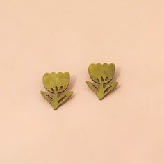 Elevate any outfit with these Brass Tulip Stud Earrings! Sweet and playful, yet oh-so-elegant, these earrings will add the perfect touch of fun and style to any look. Each earring set comes with a microfiber carrying pouch. 🌷✨ Size – 1" X 3/4"Process – Brass with Surgical Steel Ear PostOrigin – Made in Kansas City, MO Whimsical Gold Flower-shaped Earrings, Kansas City Mo, Paper Goods, Kansas City, Earring Set, Kansas, Tulips, Stud Earrings, Pouch