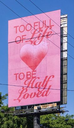 a large pink billboard with the words toofull of joy to be bold power