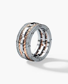 Three bold-looking bands pave set with 1.05ct brilliant cut round white diamonds connected by signature exclusive Rockford screws with rope designs flowing in between the bands, our ROPES men’s two-tone wedding band has a very modern, striking look with a luxurious spin. This men’s diamond ring will make an exquisite men's wedding band, in addition to being a one-of-a-kind designer ring. Rope Wedding Band, Mens Diamond Wedding Bands, Mens Gold Wedding Band, Rope Rings, Big Diamond, Gold Wedding Band, Mens Wedding Rings, Men's Rings, Ring Collections