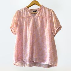 New This Papermoon Blouse Is Beautifully Detailed! It Is A Short Sleeve V-Neck, With A Gathered Bust Line And Gathered Sleeves. It Has A Ruffled Neckline And Ruffled Shoulder Seams With Elastic Sleeves. This Lined Top Is Made From A Pink Floral Print, And Available In A Size M. Fabric & Care Self: 100% Polyester Lining: 95% Polyester, 5% Spandex Machine Wash Cold, Tumble Dry Low. Measurements 21” Armpit To Armpit Spring V-neck Pink Blouse, Pink V-neck Blouse For Spring, Feminine Pink V-neck Blouse, Red Short Sleeve Blouse, Stitch Fix Women, Royal Blue Blouse, Tie Sleeve Blouse, Burgundy Blouse, Sheer Floral Blouse