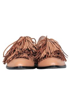 Add some flare in your step with these Loeffler Randall loafers. The rich tan color is the perfect shade for going into Spring and Summer. The added tassel fringe ties creates a playful look that works well with any tailored pant for the office! Size 6 Made in Brazil 100% Leather Lace up tie Tassel fringe detail Heel height .5" Toe to heel 10" Loeffler Randall, Tassel Fringe, Leather Tassel, Leather Lace, Tan Color, Leather And Lace, Tan Leather, Brazil, Tassels