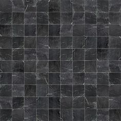 a black tile wall that looks like it is made out of marble