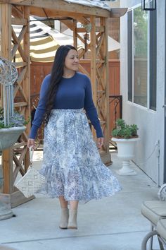 Cory features a soft light knit, with faux buttoned sleeves and a nice stretch. Dress it up or wear it casual! You can't go wrong! Modeled in large 5’5.5”. Paired with our new Kacey skirt. 55% Viscose/30% Polyester/15% Nylon Small (bust 34/36") Medium (bust 36/38") Large (bust 38/40") Light Blue Skirt Outfit, Toile Skirt, Blue Skirt Outfits, Reunion Outfit, Blue Knit Top, Light Blue Skirts, Elegant Wear, Pentecostal Fashion, Church Fits