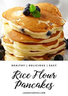 a stack of pancakes with blueberries on top and the words healthy delicious easy rice flour pancakes