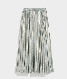 Shimmery metallic fabric adds a touch of shine (and a whole lot of style) to this season's must-have pleated midi skirt. Chic Metallic Flowy Skirt, Chic Flowy Metallic Skirt, Elegant Metallic Long Skirt, Glamorous Midi Skirt For Spring, Chic Metallic Pleated Skirt, Elegant Metallic Midi Skirt, Relaxed Pleated Skirt For Fall Parties, Metallic Lined Flared Skirt, Metallic Flowy Skirt For Spring