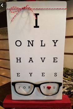 an eye chart sign with glasses on it that says i only have eyes for you