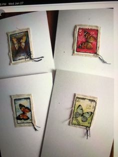 four different stamps with butterflies on them