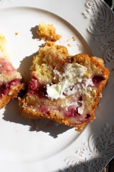 two pieces of cake sitting on top of a white plate