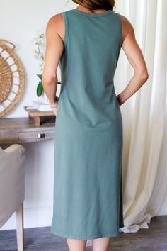 Get ready to slay in the Paige Midi Dress! Perfect for any occasion, this everyday dress is the perfect combination of comfort and style. Simply pair with your favorite sneakers and a denim jacket and you're good to go. You'll be turning heads wherever you go! 96% Cotton 4% Spandex Color: Green Sleeveless Midi Dress Scoop Neck Relaxed Fit Light Weight No button/zipper closure No elastic T-shirt Style Midi Dress Model is wearing small Model is wearing a size Small. She is 5'6". 135lbs. Bust: 34C Style Midi Dress, Bottom Workout, Everyday Dress, Sleeveless Midi Dress, Green Midi Dress, Dressy Tops, T Shirt Style, Everyday Dresses, Midi Dress Sleeveless