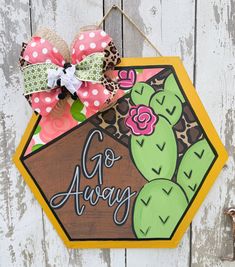 Welcome your guests with a bright, bold and beautiful Cactus Welcome Porch Sign! This sign is painted in muted tones of pretty pinks and muted green with a desert cactus wreath hanging from the top. This door decor will definitely add a touch of boho-chic to any entrance. ABOUT THIS DOOR HANGER: 🌵 Bows are included and secured with staples! 🪵 Shapes are laser cut from 1/4" Revolution plywood 🌸Size is 22" wide 🪴Comes with Jute twine attached to hang sign ☀️Back is unfinished but can be painte Door Hanger Bows, Wooden Door Decor, Cactus Wreath, Boho Porch, Teacher Door Hangers, Wreath Hanging, Beautiful Cactus, Teacher Doors, Porch Welcome Sign