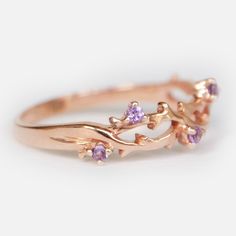 Engagement Ring Details 14k Solid Rose Gold (Also available in White and Yellow Gold, Please select at checkout) 2mm (Approximate Band Width) Amethyst (Center Stone) Round 1.75mm (Center Stone Dimensions) 0.10 Carats (Average Center Stone Weight/ 5 Pcs.) Ring can be resized from 3-10, Metal can be made in 14, 18K/ White, Yellow and Rose Gold. For custom order this ring with a different stone, please contact us. - - - SHIPPING POLICY - - - This ring is made to order, please allow 7-10 business da Delicate Amethyst Ring For Anniversary, Rose Gold Amethyst Birthstone Ring For Promise, Rose Gold Amethyst Ring For Promise, Delicate Amethyst Anniversary Ring, Dainty Rose Gold Amethyst Wedding Ring, Dainty Rose Gold Amethyst Promise Ring, Rose Gold Amethyst Promise Ring, Rose Gold Amethyst Birthstone Promise Ring, Delicate Amethyst Promise Ring