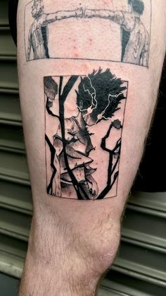 a man's leg with some sort of artwork on it and the bottom half of his leg