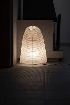 a lamp that is sitting on the ground