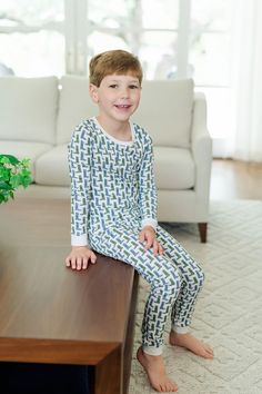 Pima cotton long sleeved pajama top and pant set. Pants have an elastic waistband. Made from 100% Peruvian Cotton For child's safety, garment should fit snugly. This garment is not flame resistant. Loose fitting clothing is more likely to catch fire. Sizing and Fit This item fits true to size. Garments that are 100% cotton will shrink when washed. We advise sizing up if you feel you are between sizes. Care Instructions Due to the nature of Pima cotton, items will shrink upon first washing. In or Cotton Baby Clothes, Magnolia Baby, Concert Fashion, Twirl Skirt, Romper And Jacket, Top And Pants Set, Pajama Pant, Bubble Romper, Pajama Top