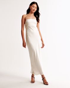 Slim-fitting maxi dress in our textured satin fabric, featuring a back-bow detail, low cowl-back detail and adjustable straps for the perfect fit! Cute Jumpsuits, Skort Dress, Fame And Partners, Fitted Maxi Dress, Slip On Dress, Cutout Maxi Dress, Mini Dresses Online, Knit Jumpsuit, Maxi Dress Online