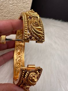 Traditional Bangles comes in set of 2Color : GoldSize : Size : 2.4Stones : CZ Red Green Stones Traditional Bangles, Kada Bangles, Green Stones, Social Events, Green Stone, Indian Jewelry, Gold Finish, Red Green, Bangles