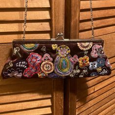 Colorful Brown Satin Bag/Clutch With Embroidered And Embellished Beads And Sequins Clutch Beaded Designs On The Front And Back, A Removable Chain Shoulder Strap That Can Be Hidden Inside, Twist Snap Closure And Brown Satin Lining With A Pocket On One Side. Size 10.5 Wide X 4” Tall. Nwot. Formal Multicolor Embellished Shoulder Bag, Party Bags With Multicolor Embroidery And Beaded Details, Multicolor Embellished Handheld Evening Bag, Beaded Designs, Sequin Clutch, Embellished Bags, Brown Satin, Satin Bags, Bead Designs