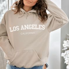 The ultimate in Los Angeles, Southern California cool, this understated and over-sized hoodie sweatshirt is the perfect way to rock the laid-back, California vibe. Unisex sizes - order one to two sizes up for the oversized look. More from this collection at threeEmarket.etsy.com Free Shipping with orders over $35.  This unisex heavy blend hooded sweatshirt is relaxation itself. Made with a thick blend of cotton and polyester, it feels plush, soft and warm, a perfect choice for any cold day. In t Oversized Hoodie Sweatshirt For College, Hooded Sweatshirt With Letter Print Relaxed Fit, Relaxed Fit Hooded Sweatshirt With Letter Print, Trendy Relaxed Fit Hoodie For College, Letter Print Hoodie Sweatshirt For Loungewear, Oversized Letter Print Hoodie For Loungewear, Loungewear Letter Print Hoodie Sweatshirt, Everyday Hooded Hoodie With Letter Print, Oversized Letter Print Hoodie Athleisure