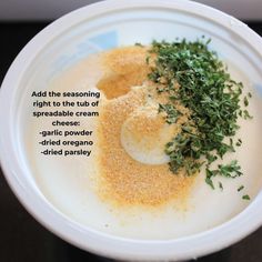 a white plate topped with food on top of a table