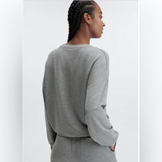 Ultra Lightweight, Pullover In Charcoal Gray. Brand New With Tags. Size Large. Oversized Athleisure Sweatshirt For Relaxation, Gray Crew Neck Activewear For Loungewear, Sporty Tops With Ribbed Cuffs For Relaxation, Sporty Fall Activewear For Relaxation, Workout Tops With Ribbed Waistband And Relaxed Fit, Athleisure Relaxed Fit Sweatshirt For Relaxation, Relaxed Fit Athleisure Sweatshirt For Relaxation, Versatile Sweatshirt With Ribbed Cuffs For Loungewear, Versatile Loungewear Sweatshirt With Ribbed Cuffs