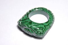 Buyer Will Receive 1 Piece Natural Malachite Full Carved Single Gemstone Made Ring.you will really love it.you will gift it to your love ones and friends. Product Details Product Name - Natural Malachite Full Carved Single Gemstone Made Ring. Gemstone - Natural Malachite Quantity - 1 Piece 100% Natural ----------------------------------------------------------------------------- THIS BEAUTIFUL ITEM IS AVAILABLE ONLY ON ETSY ------------------------------------------------------------------------ Green Gemstone Ring With Stone Setting, Luxury Green Collectible Rings, Green Malachite Rings As A Gift, Collectible Green Emerald Rings, Green Carved Rings Perfect For Gifts, Luxury Green Crystal Ring With Gemstone, Green Malachite Rings For Anniversary, Green Carved Rings For Anniversary, Unique Green Crystal Gemstone Ring