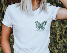 Butterfly Bible Verse Shirt, Freedom Shirt (Unisex  Crew Neck Tee) This colorful and artistic t-shirt is likely to become your new favorite! It's extremely comfortable and the unisex cut is flattering for both men and women. Perfect for yourself or as gift for teacher or Mom. This classic unisex jersey short sleeve tee fits like a well-loved favorite. Soft cotton and quality print you will love and want to wear every day.  - standard unisex sizing - true to size - 100%  cotton (fiber content may vary for different colors) - Made in America -------SHIRT COLORS------- Please see images for all color options! -------CARE INSTRUCTIONS------- Turn inside out. Machine wash cold. Tumble dry low. Do not bleach. Do not iron directly on design. Returns accepted within 14 days of receipt. Returned it Casual Tops With Custom Artwork For Gift, Casual Tops With Custom Artwork As Gift, Butterfly Christian Shirt, Casual Butterfly Print T-shirt For Streetwear, Cheap Butterfly Print Graphic T-shirt, White Cotton T-shirt With Butterfly Print, Freedom Shirts, Multicolor Cotton T-shirt With Butterfly Print, Crew Neck Tee