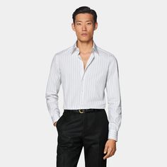 This white striped shirt is tailored to a formal tailored fit and features a large point collar, single cuff, french placket and mother of pearl buttons. Elegant Striped Button-up Dress Shirt, Formal White Custom Fit Shirt, Striped Collared Dress Shirt For Business Casual, Business Dress Shirt With Striped Collar And Long Sleeves, Business Dress Shirt With Striped Collar, Business Long Sleeve Dress Shirt With Striped Collar, Fitted Pinstripe Shirt For Business Casual, Formal Striped Slim Fit Dress Shirt, Fitted Dress Shirt With Striped Collar For Business Casual